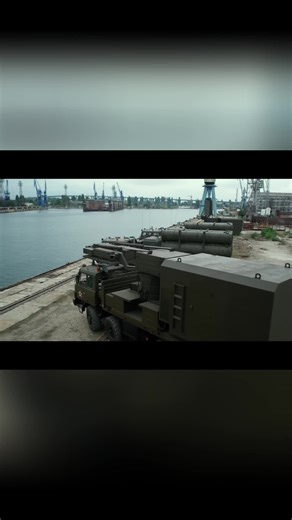 Strategic maneuvers unfold: missile trucks on dock, submarine launch sequence. High-stakes display of power. #MilitaryTech #NavalPower #Defense #SubmarineLaunch #Strategic