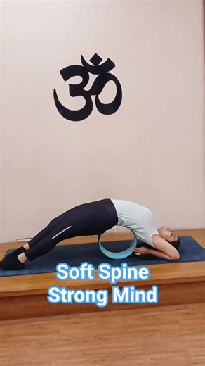 Beginner’s backbend with a little help from the wheel—stretch, breathe, trust. #modifiedchakrasana