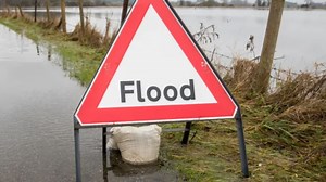 Busy Scots road CLOSED both ways after heavy rain sparks flooding chaos