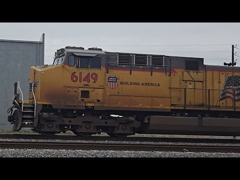 UP Westbound Intermotal Train with NS #8108 on 3rd unit