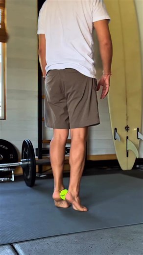 Want to build stronger arches? Try these! You can do stay in one spot and perform a heel raise with the ball squeezed between the heels. | Dr. Jacob