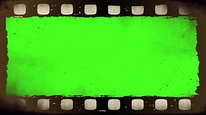 Download 4k film strip transition, with chroma key green screen background, effect of old film rolling with details, scratches and grain, vintage strip intro, concept of old movie strip free for free