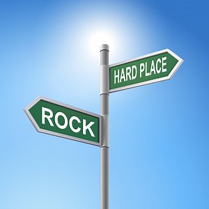 crossroad 3d vector road sign saying rock and hard place