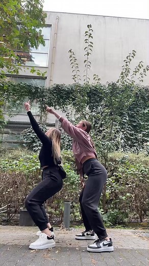 Modern Building and Energetic Dancing in Nature