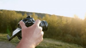 A cinematic close-up, zooming directly into the camera lens