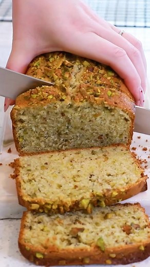(New Recipe!) EASY Pistachio Bread - perfect with your morning coffee! Delicious and dotted with tons of Pistachios! https://tatyanaseverydayfood.com/easy-pistachio-bread-recipe/ #baking #desserts #bread #recipe #bake | Tatyana's Everyday Food