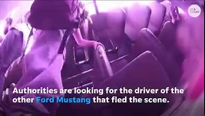 Disturbing footage captures moment a school bus filled with children is flipped by a speeding car. | USA TODAY Video