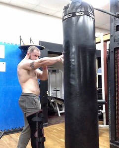 4.1K views · 11 shares | A little heavy bag practice, not too much power as my right hand isn’t quite up to taking direct force on the knuckles yet (But getting there ) but even on one leg and not heavy punches, elbow and knee strikes have always been my ‘go to’ anyways Point blank refuse to let injuries hamper me, just need go train smart and keep positive ❤️ | Marshall Arkley | Facebook