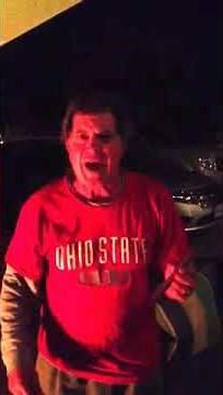 Ohio State fan singing the Michigan fight song
