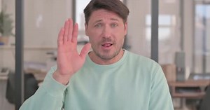 Portrait of Man Waving Hand to Say Hello