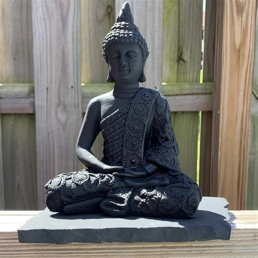 Large Shungite Meditation Buddha SHIELDING • PURIFYING • GROUNDINGOrigin: Russia Said to be around 2 billion years old, Shungite is a very powerful, ancient stone that detoxifies your body by absorbing and eliminating any negative or health hazardous energies. A Shungite Stone can be used for EMF protection, purification of the body, general healing and well-being, and much more. Shungite Buddha: • Gemstone: Shungite• Design: Hand Carved Buddha• Mudra: Dhyana• Origin: Russia• Approximate Size: 1