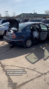 A Volkswagen Passat with trailer license plates, full of junk with a taped up sunroof = the norm around here. | Auto Parts City, Inc.