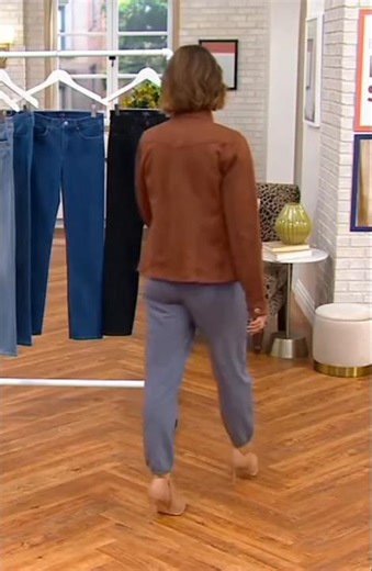 QVC host Amy Stran models pants