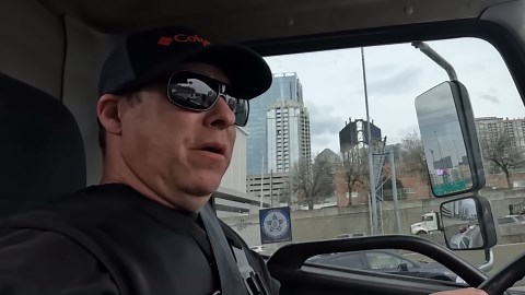 Illegally Parked Cars Get Towed in Downtown Crackdown