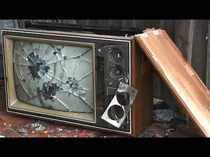 Smashing a Vintage His Master's Voice Nipper-48 12643 CRT Television