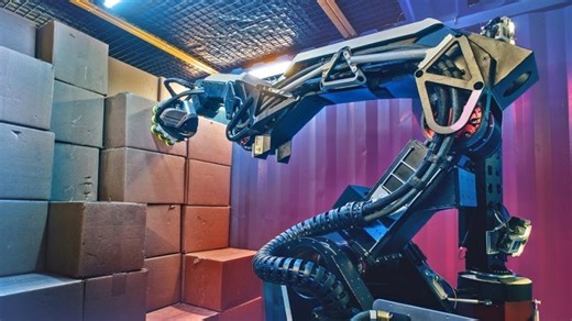 Watch Boston Dynamics Robot Unload Containers | Adelmo Imperi