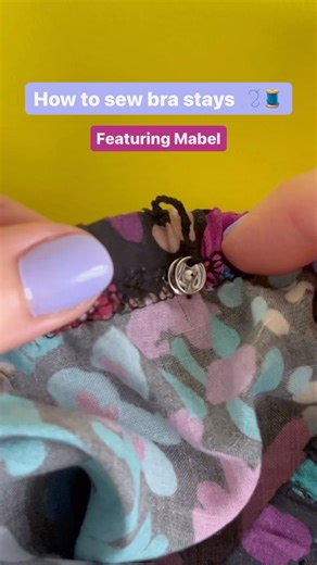 Tilly and the Buttons | Learn to sew with easy sewing patterns on Instagram: "How to sew bra stays 🪡🧵 The Mabel blouse and dress is designed to cover your bra straps. However, if you want to make extra sure they won’t peep out, you can sew bra stays at the shoulders. This is also useful for strappy tops and dresses! 1) Cut a long piece of thread (1m/1yd or so), fold in half, thread the fold through a needle to make it four strands thick, and tie a double knot in the end. 2) Make 