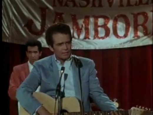 Merle Haggard – Swinging Doors...🎧 Watch full this song: https://bestcountrysongs.dohimusic96.com/merle-haggard-swinging-doors/?utm_source=facebook&utm_medium=ngreel&utm_campaign=vintagecountrymelodies | Vintage Country Melodies