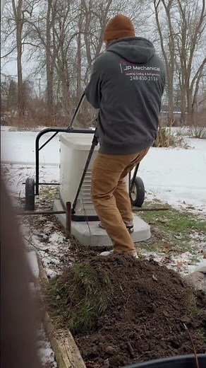 Moving a generac generator using a snowmobile dolly.