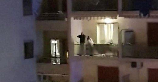 Quarantined Italians sing together from balconies