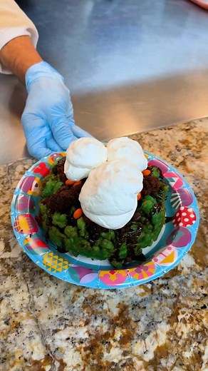 Disney Eats on Instagram: "It looks deviously delicious to us 🤩💚 NEW! The MONSTER Funnel Cake at Stage Door Café for a limited time: Green funnel cake with chocolate sauce, crumbled brownie, peanut butter candy pieces, and whipped cream #DisneyEats #Disneyland"