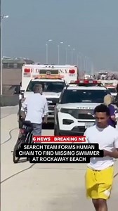 Search team forms human chain to find missing swimmer at Rockaway Beach