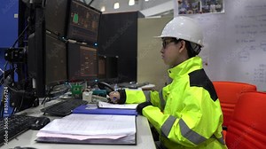 Computer Engineer Working in a Large Industrial Factory, Using Programming Software to Control Machinery and Develop Systems for Automation and Efficiency Improvement,work at server