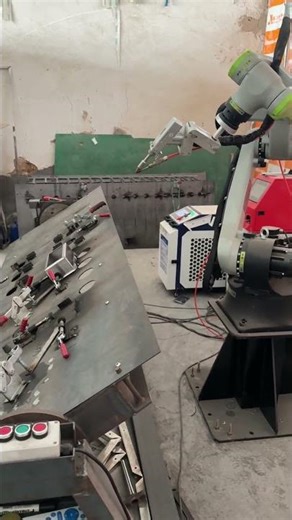 A laser welding robot modified from a handheld laser, paired with a positioner made by the customer.