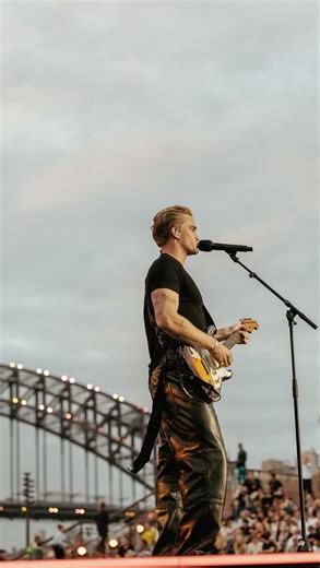 “Never Tear Us Apart” by @officialinxs live on the Sydney Opera House steps. I love you Michael. | Cody Simpson