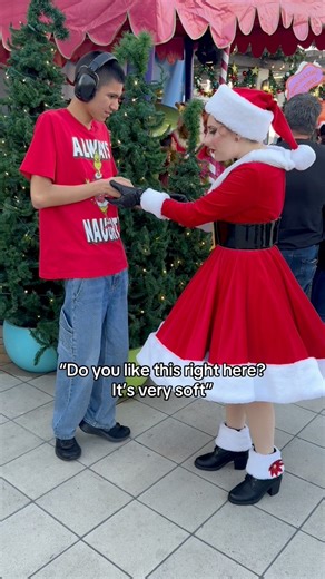 Martha May Whovier taking Thomas with her on a stroll to wave to the Grinch #autism #autismawareness #autismacceptance #asd #specialneeds #universalstudios #universalstudioshollywood #howthegrinchstolechristmas #grinchmas #thegrinch #marthamay #marthamaywhovier #fblifestyle | MagicWithThomas