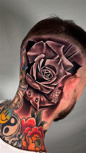 Cody Redwoodink Tatoos on Instagram: "Blasted a rose on the dome piece the other day to fill the open area!! Pretty fun one for sure. @revolution__ink @kingpintattoosupply @metalfingers.com.au @wickedfastskincare @fkirons @fusion_ink #explorepage✨ #foryoupage💙 #headtattoo #rose #blackandgreytattoo"
