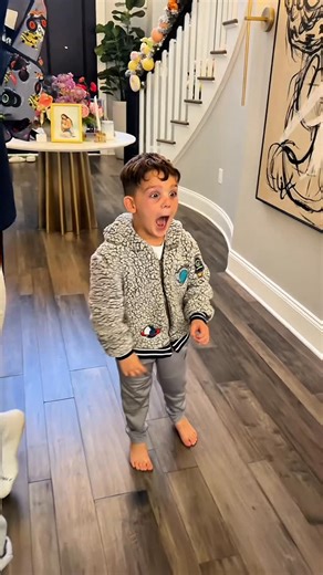 CARLI BYBEL on Instagram: "got to surprise my baby with new holiday decorations this year🥹🌈🍭 his favorite color is rainbow so we turned my house into a rainbow candyland!! Thank you so much @marcelaroquedecor for making our dream a reality! your talent is unmatched! Highly recommend her if your in NJ✨💓 #holidaymagic #candyland"