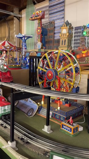 All aboard the Christmas Light Express! Featuring LED lights and Christmas Carol music, this set is guaranteed to keep the magic of Christmas alive for years to come! Starter sets make the perfect last minute holiday gift! They come with everything you need to run the train (except for three AAA batteries for the remote!!) #lioneltrain #thetrainstation #trainset #christmastrain #thepolarexpress #christmastrainset | The Train Station - Mountain Lakes