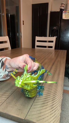 This 3-D printed dragon is pretty awesome and it comes in so many different colors! #3dprinteddragon