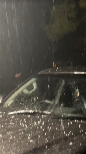 Hailstorm Hitting Car at Night