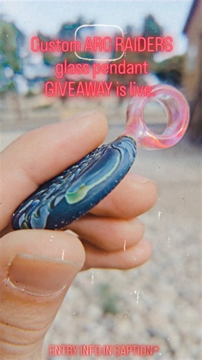 The BawkSho on Instagram: "Hey, Raider! I am giving away this 1/1 ARC Raiders themed glass pendant for those brave enough to rep Topside and support death to rats. Entry is easy! 3 ways to enter. And stackable! TAG someone ! Each new tag is a new entry. Join the SHO! follow the stream on KICK to gain an entry. LINK IN BIO LASTLY: when watching the live stream, just answer the stream question and get involved in the SHO to gain more entries! Good luck to all and hope to see you during the SHO! 🔔