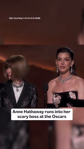 Anne Hathaway runs into her scary boss at the Oscars