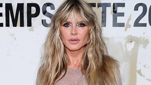 Heidi Klum reveals her bare chest in a completely see-through dress