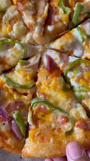 Slice of heaven! 😋 Cheese, onions, and capsicum - the ultimate trio! 🔥