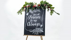 DIY wedding garland chalkboard sign