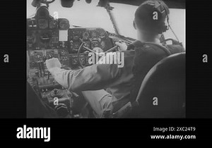 1952 - Paratroopers are dropped immediately before and after an atomic bomb drop at a US military desert test site Stock Video Footage - Alamy