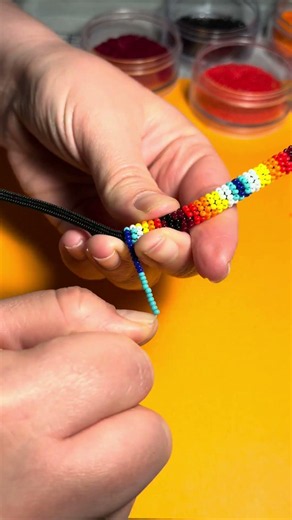 bead wrap in traditional fire colors #beads #bracelet #ropebracelet #traditional #tribal #beaded