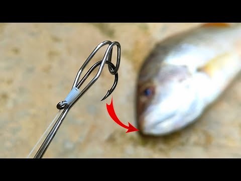 Check out the amazing tool fishermen make to remove the hook from the fish's mouth