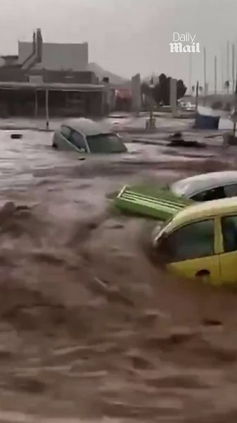 Storm batters Greek island of Paros causing flood to sweep away cars