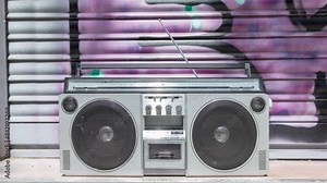 ghetto blaster against changing urban backgrounds
