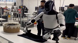 Elon Musk posts a video of Tesla robot Optimus folding a shirt