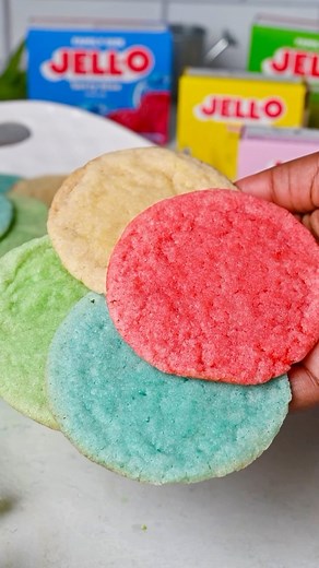 You may not be able to buy happiness, but you sure can bake it! These Jell-O cookies are easy to make and the best part is you can use your favorite JELL-O flavor 🎉 Don’t forget to save this post for later!📩 Here’s how to make them👇 Ingredients: Your Favorite Flavor of JELL-O Gelatin Premade Sugar Cookie Dough Granulated Sugar How to Make It: 1. Mix roughly 2 tablespoons of JELL-O with approximately half a package of premade sugar cookie dough. 2. Roll your cookie dough into balls and toss th