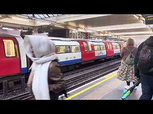 Jubilee line trains leaving and arriving at Finchley Road