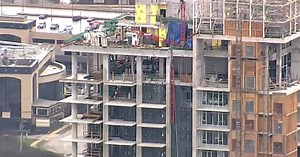 Crane dangling at Burnaby condo construction site