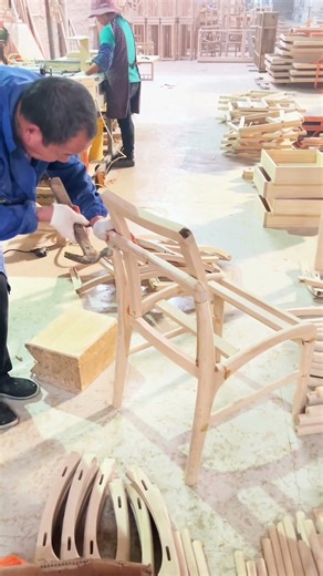 Carpenter Assembling Wooden Chair Frame with Hand Tools